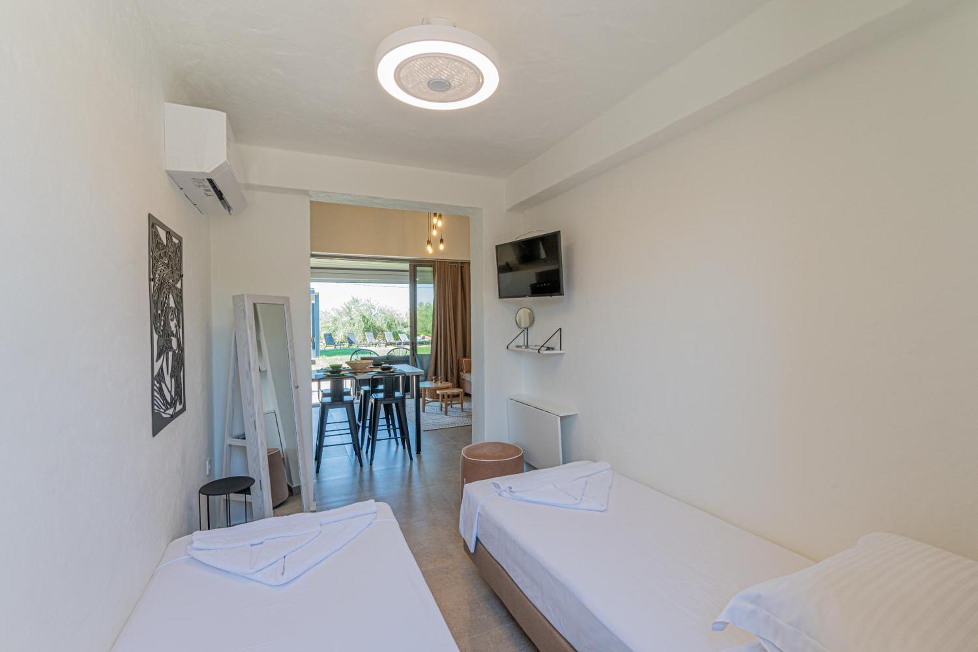 Irissa Suites Paralia Irion Quarto foto