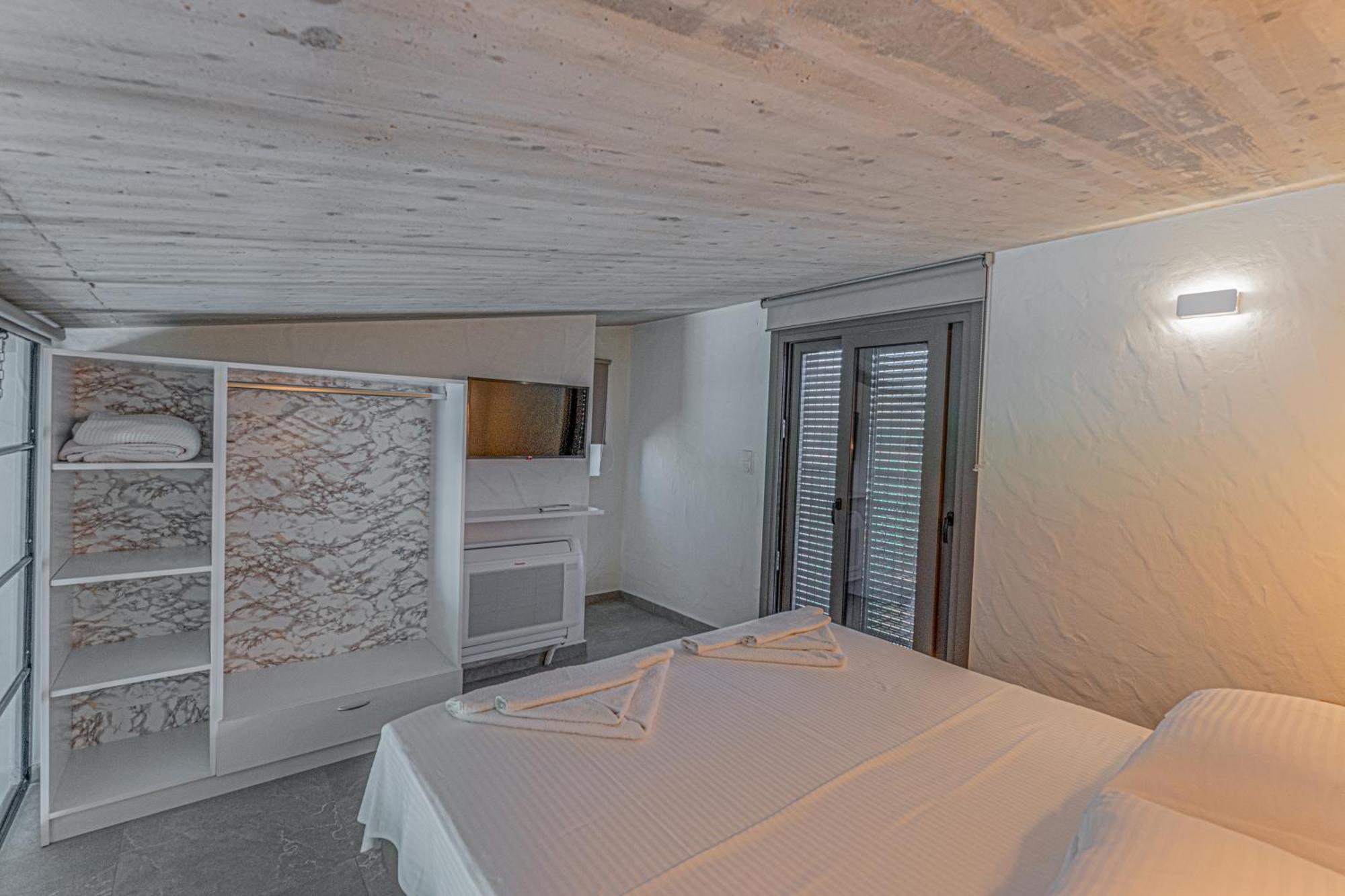 Irissa Suites Paralia Irion Quarto foto